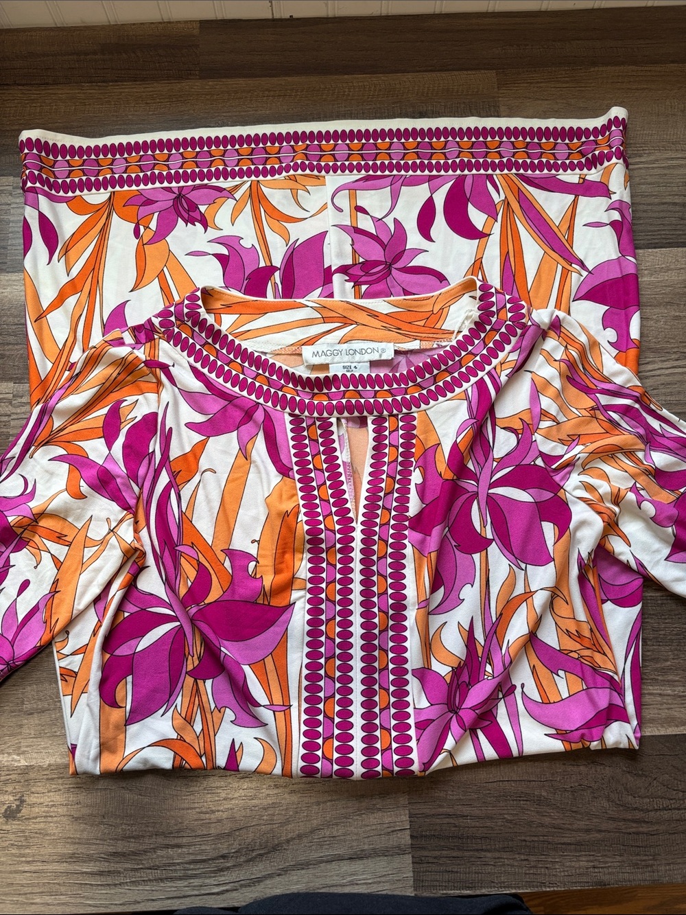 Maggy London tunic dress featuring a vibrant tropical floral pattern